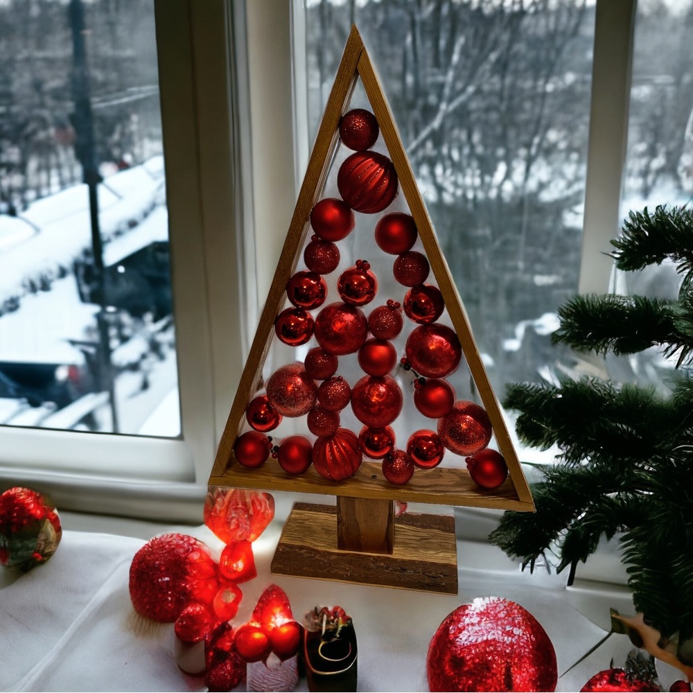 Handmade rustic Christmas Tree with festive ornaments.